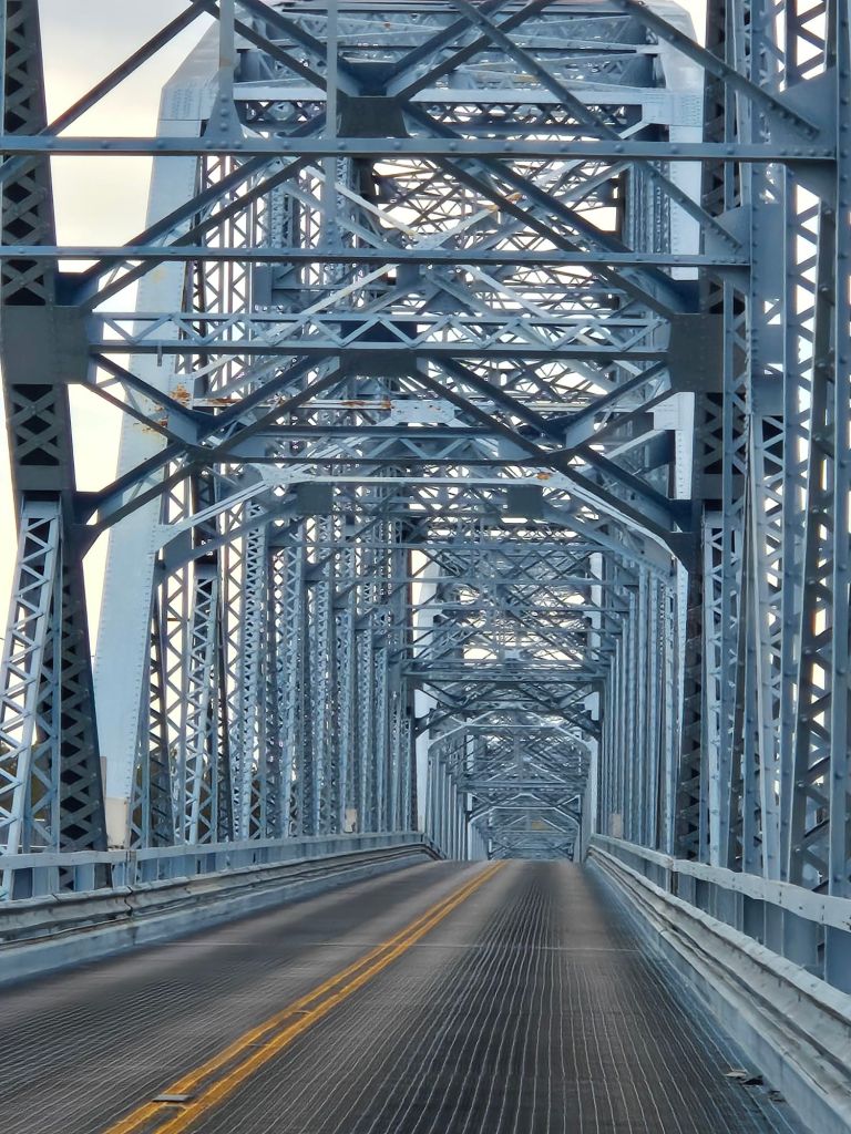 Geometric metal framework of a steel truss bridge