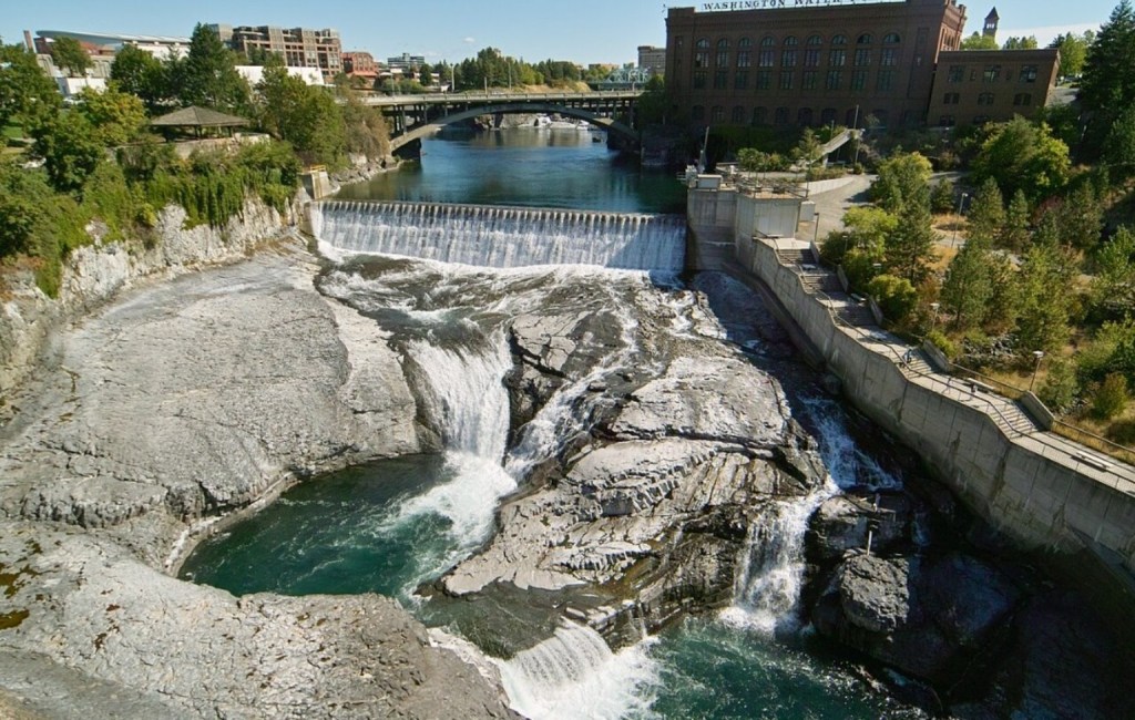 Lower Spokane Falls cascading over rocky ledges below the Monroe Street Dam, seen from Monroe Street Bridge in Spokane, Washington