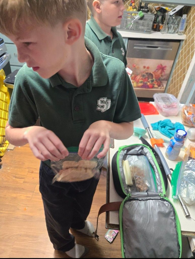 Declan packing his own school lunch